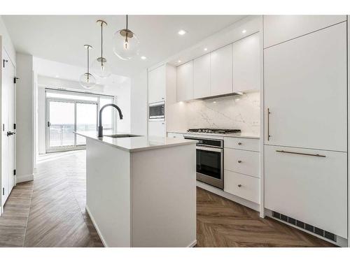 608-8445 Broadcast Avenue Sw, Calgary, AB - Indoor Photo Showing Kitchen With Upgraded Kitchen