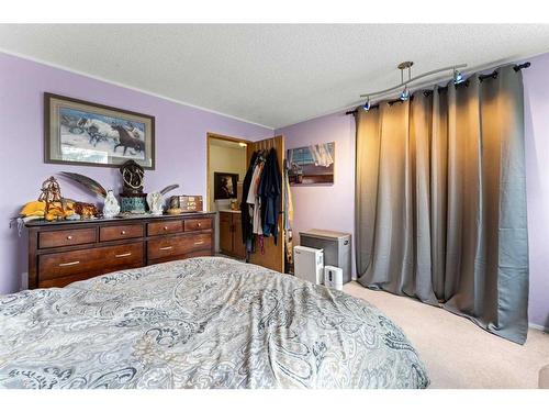 35 Riverbend Drive Se, Calgary, AB - Indoor Photo Showing Bedroom