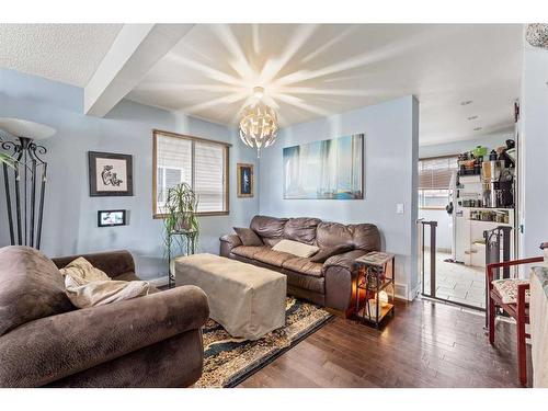 35 Riverbend Drive Se, Calgary, AB - Indoor Photo Showing Living Room