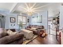 35 Riverbend Drive Se, Calgary, AB  - Indoor Photo Showing Living Room 