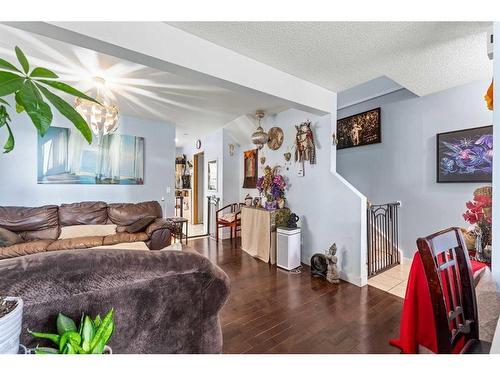 35 Riverbend Drive Se, Calgary, AB - Indoor Photo Showing Living Room