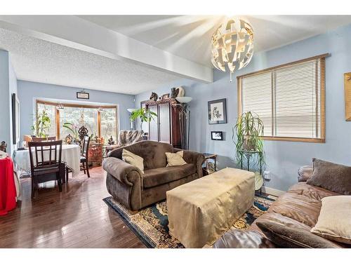 35 Riverbend Drive Se, Calgary, AB - Indoor Photo Showing Living Room