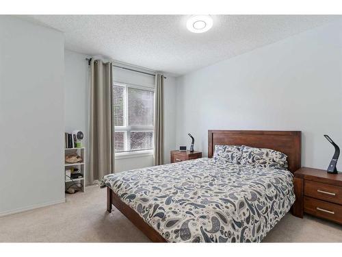 20 Erin Woods Court Se, Calgary, AB - Indoor Photo Showing Bedroom