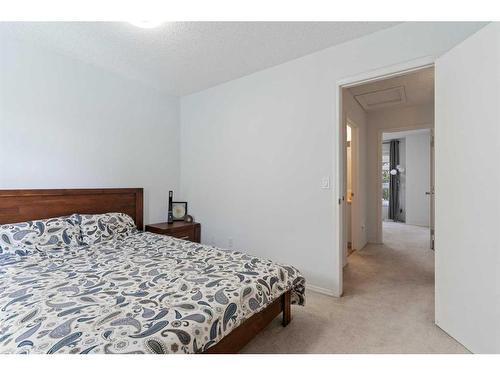 20 Erin Woods Court Se, Calgary, AB - Indoor Photo Showing Bedroom