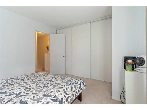 20 Erin Woods Court Se, Calgary, AB - Indoor Photo Showing Bedroom