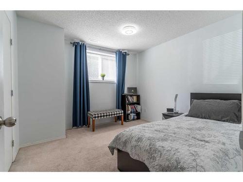 20 Erin Woods Court Se, Calgary, AB - Indoor Photo Showing Bedroom