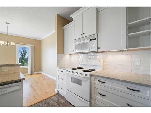 308-200 Patina Court Sw, Calgary, AB - Indoor Photo Showing Kitchen