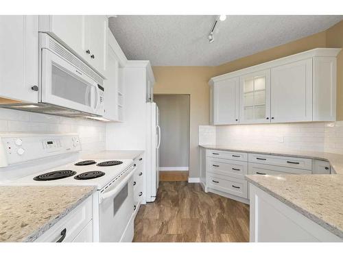 308-200 Patina Court Sw, Calgary, AB - Indoor Photo Showing Kitchen