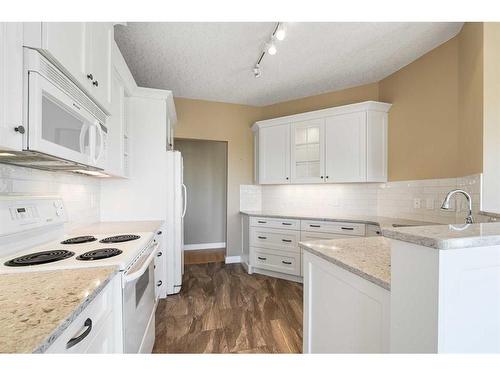 308-200 Patina Court Sw, Calgary, AB - Indoor Photo Showing Kitchen