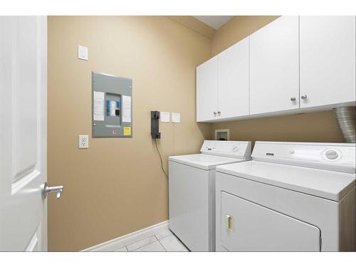 308-200 Patina Court Sw, Calgary, AB - Indoor Photo Showing Laundry Room