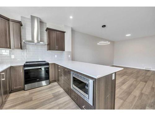 137 Corner Glen Way Ne, Calgary, AB - Indoor Photo Showing Kitchen With Stainless Steel Kitchen With Upgraded Kitchen