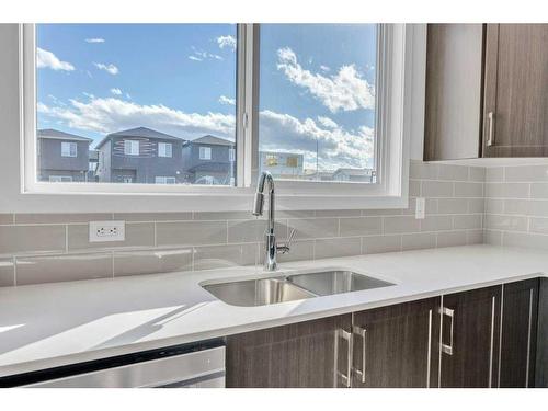 137 Corner Glen Way Ne, Calgary, AB - Indoor Photo Showing Kitchen With Double Sink