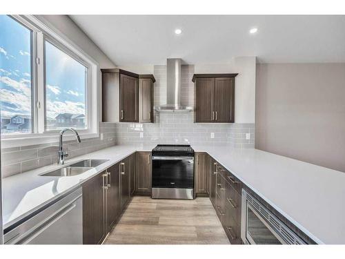 137 Corner Glen Way Ne, Calgary, AB - Indoor Photo Showing Kitchen With Stainless Steel Kitchen With Double Sink With Upgraded Kitchen