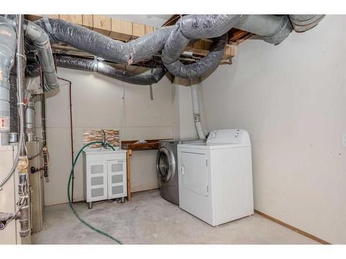 261025 Mountain View Road Nw, Calgary, AB - Indoor Photo Showing Laundry Room