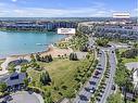 2417-11 Mahogany Row Se, Calgary, AB  - Outdoor With Body Of Water With View 