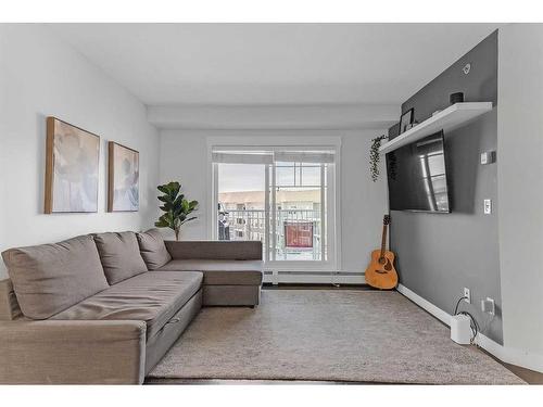 2417-11 Mahogany Row Se, Calgary, AB - Indoor Photo Showing Living Room