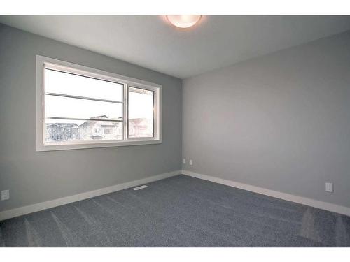 67 Lambeau Lane Se, Airdrie, AB - Indoor Photo Showing Other Room