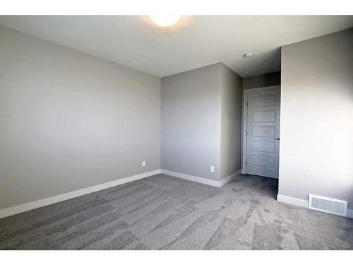 67 Lambeau Lane Se, Airdrie, AB - Indoor Photo Showing Other Room