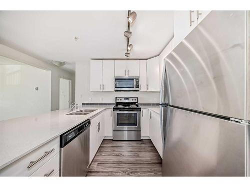 4209-181 Skyview Ranch Manor Ne, Calgary, AB - Indoor Photo Showing Kitchen With Stainless Steel Kitchen With Double Sink