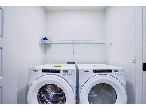 57 Legacy Reach Crescent, Calgary, AB - Indoor Photo Showing Laundry Room