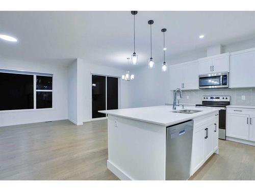 57 Legacy Reach Crescent, Calgary, AB - Indoor Photo Showing Kitchen With Upgraded Kitchen