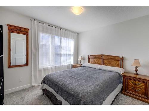 22 Evanscrest Park Nw, Calgary, AB - Indoor Photo Showing Bedroom