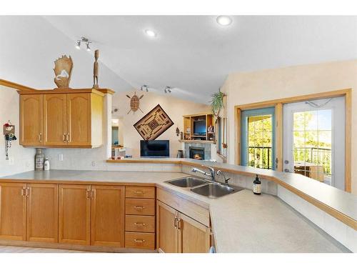 20-31222 Range Road 20A, Rural Mountain View County, AB - Indoor Photo Showing Kitchen With Double Sink