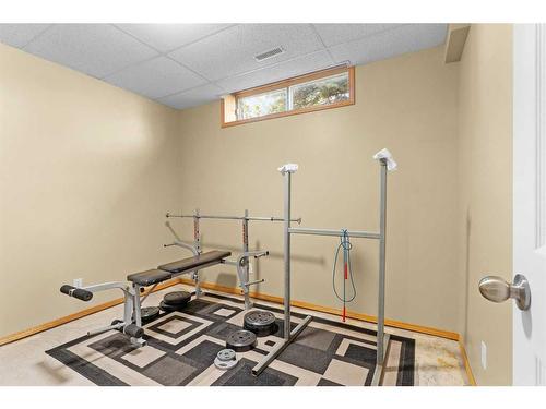 20-31222 Range Road 20A, Rural Mountain View County, AB - Indoor Photo Showing Gym Room