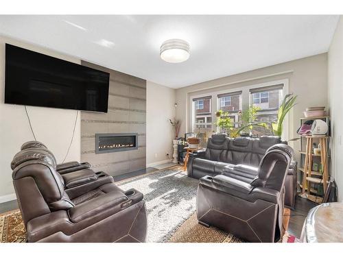 109 Redstone Drive Ne, Calgary, AB - Indoor Photo Showing Living Room With Fireplace