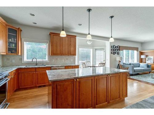 11 Evercreek Bluffs Road Sw, Calgary, AB - Indoor Photo Showing Kitchen With Double Sink