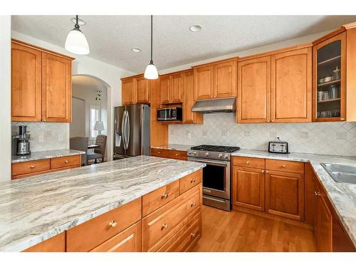 11 Evercreek Bluffs Road Sw, Calgary, AB - Indoor Photo Showing Kitchen With Stainless Steel Kitchen