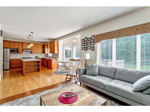 11 Evercreek Bluffs Road Sw, Calgary, AB - Indoor Photo Showing Living Room