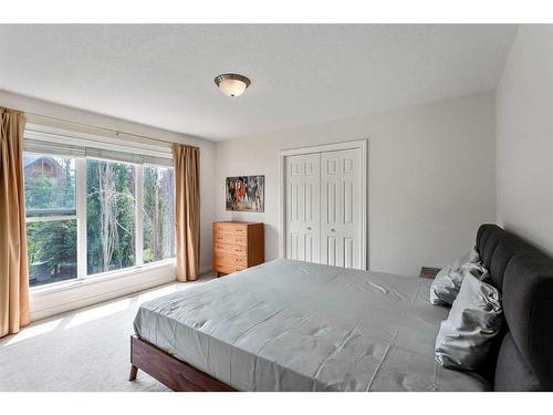 11 Evercreek Bluffs Road Sw, Calgary, AB - Indoor Photo Showing Bedroom