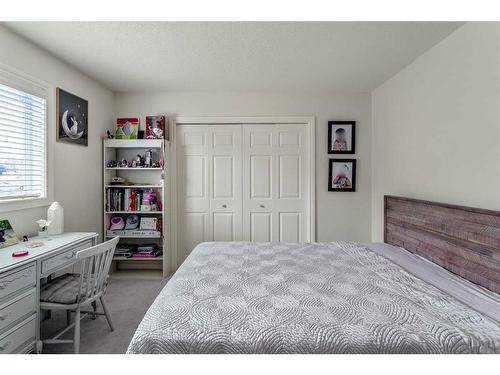 11 Evercreek Bluffs Road Sw, Calgary, AB - Indoor Photo Showing Bedroom