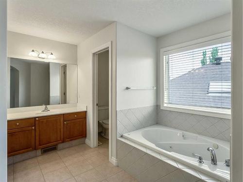 11 Evercreek Bluffs Road Sw, Calgary, AB - Indoor Photo Showing Bathroom