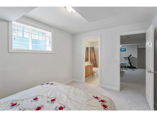 11 Evercreek Bluffs Road Sw, Calgary, AB - Indoor Photo Showing Bedroom