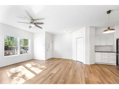 104-141 Panatella Street Nw, Calgary, AB - Indoor Photo Showing Kitchen