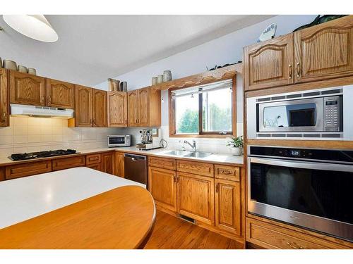 244 Sierra Morena Place Sw, Calgary, AB - Indoor Photo Showing Kitchen With Double Sink