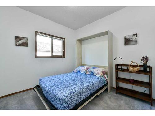 244 Sierra Morena Place Sw, Calgary, AB - Indoor Photo Showing Bedroom