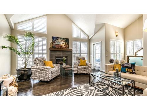 904 Patterson View Sw, Calgary, AB - Indoor Photo Showing Living Room With Fireplace