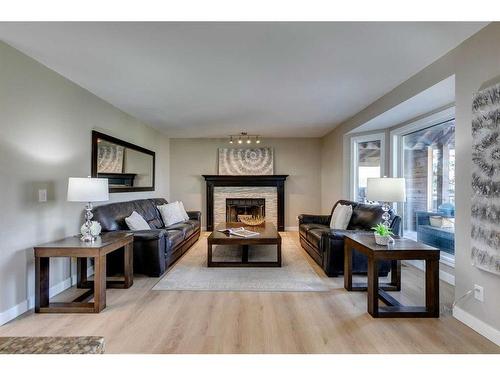 417 Douglas Woods Place Se, Calgary, AB - Indoor Photo Showing Living Room With Fireplace