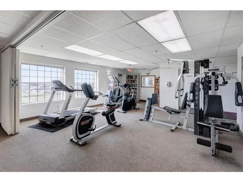 2207-950 Arbour Lake Road Nw, Calgary, AB - Indoor Photo Showing Gym Room