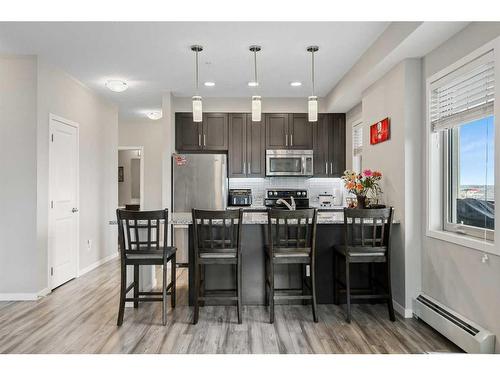 315-10 Mahogany Mews Se, Calgary, AB - Indoor Photo Showing Kitchen With Stainless Steel Kitchen With Upgraded Kitchen