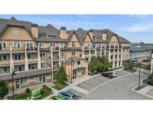 315-10 Mahogany Mews Se, Calgary, AB - Outdoor With Balcony With Facade