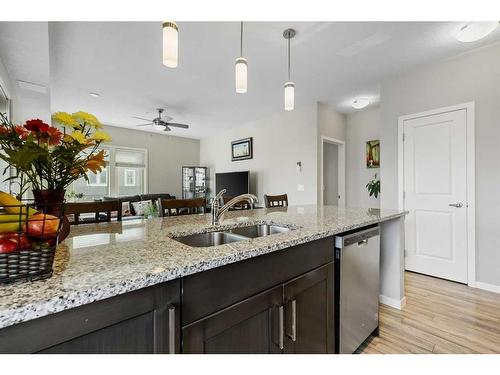 315-10 Mahogany Mews Se, Calgary, AB - Indoor Photo Showing Kitchen With Double Sink With Upgraded Kitchen