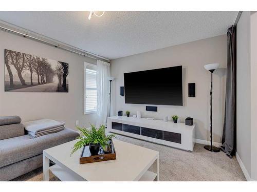 70 Auburn Springs Close Se, Calgary, AB - Indoor Photo Showing Living Room