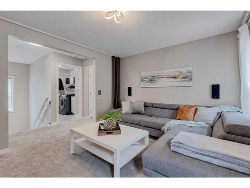 70 Auburn Springs Close Se, Calgary, AB - Indoor Photo Showing Living Room