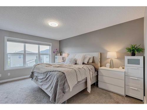 70 Auburn Springs Close Se, Calgary, AB - Indoor Photo Showing Bedroom