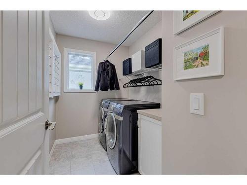 70 Auburn Springs Close Se, Calgary, AB - Indoor Photo Showing Laundry Room