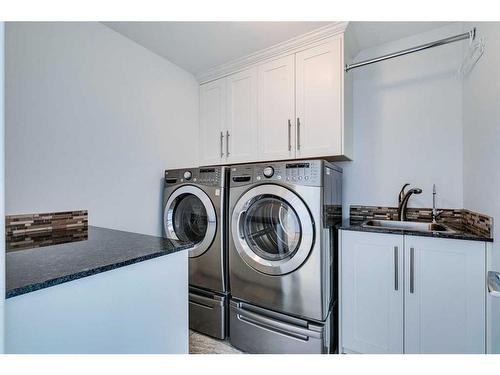 12222 Lake Erie Road Se, Calgary, AB - Indoor Photo Showing Laundry Room